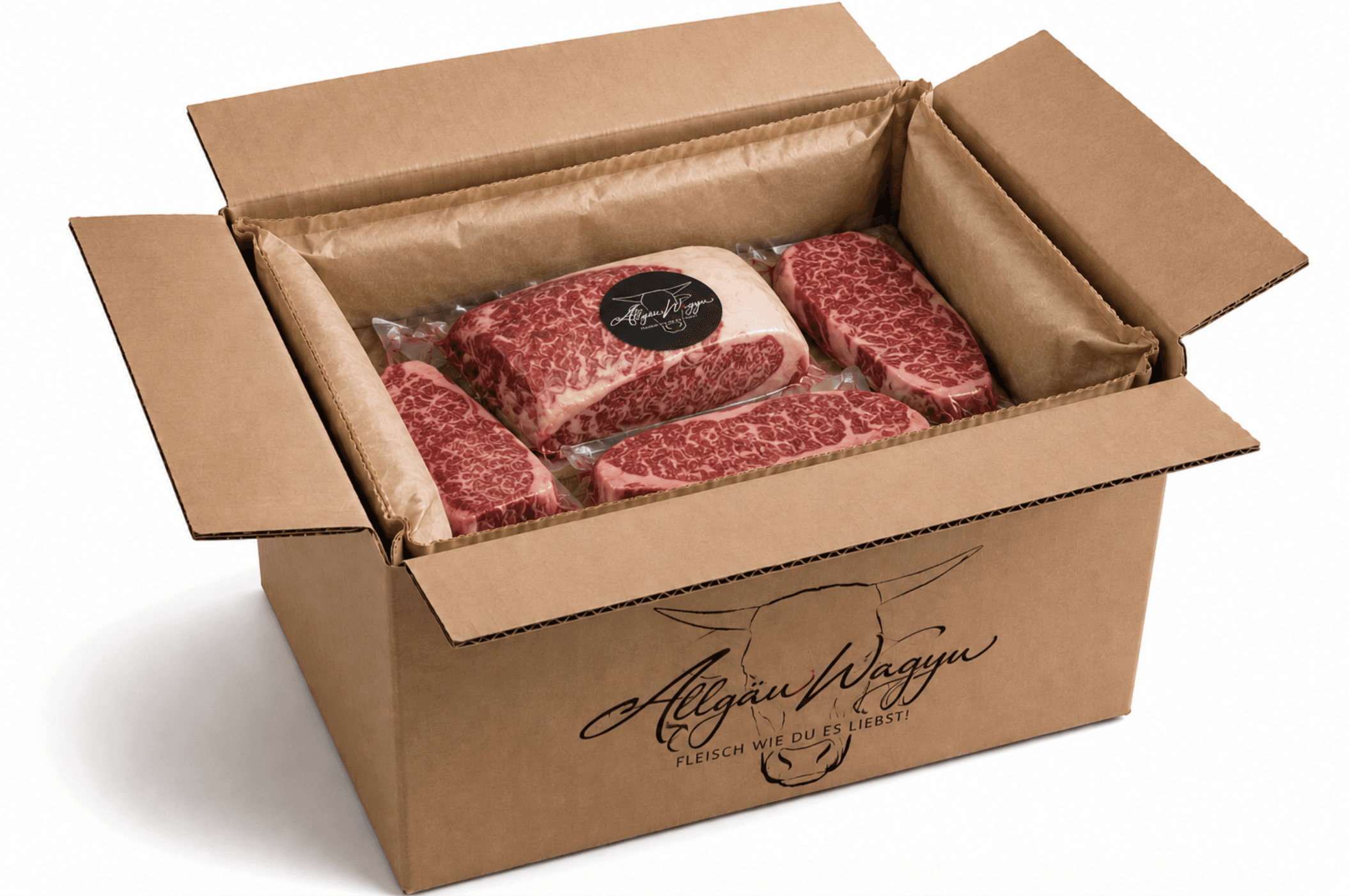 Vakuumierte Allgäu Wagyu Steaks sicher verpackt im Versandkarton mit paperfloc Isolierung